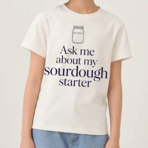 Girl wearing the Ask Me About My Sourdough Starter tee, cropped above the face